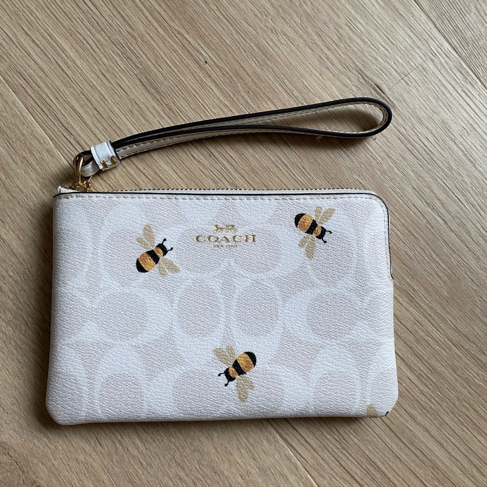 Coach Cream Signature Wristlet with Yellow & Black Bee Print
